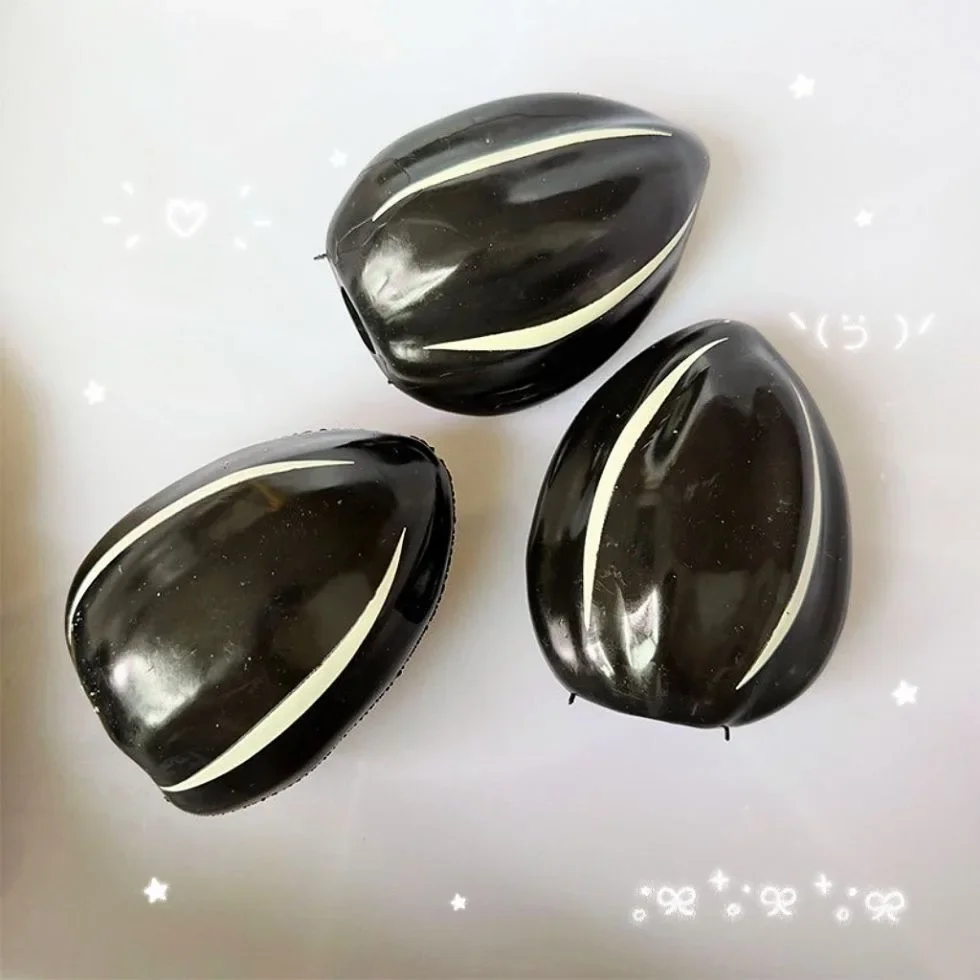 Sunflower Seed Squishy Stress  - огляд і ціна Novelty Gifts