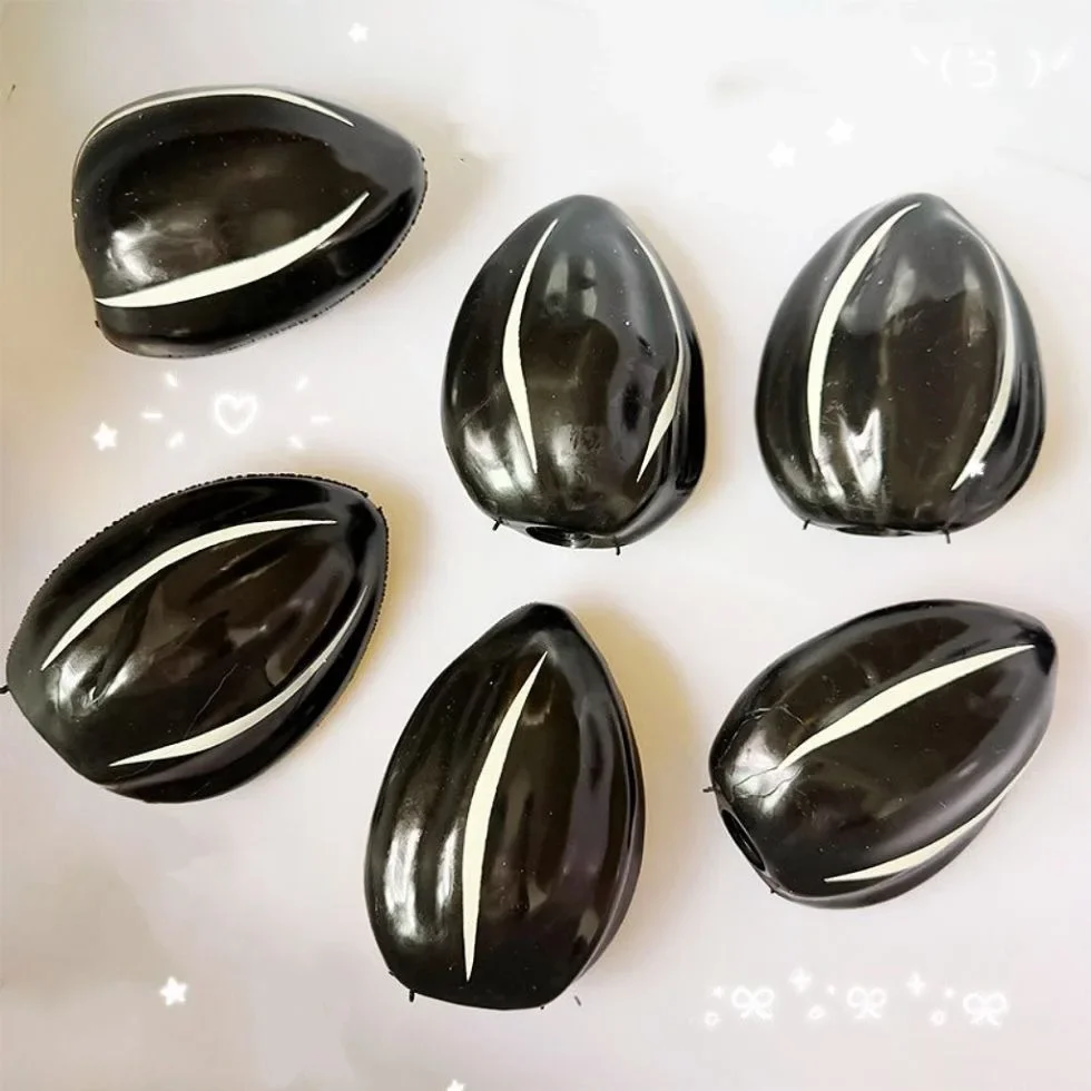 Sunflower Seed Squishy Stress  - огляд і ціна Novelty Gifts